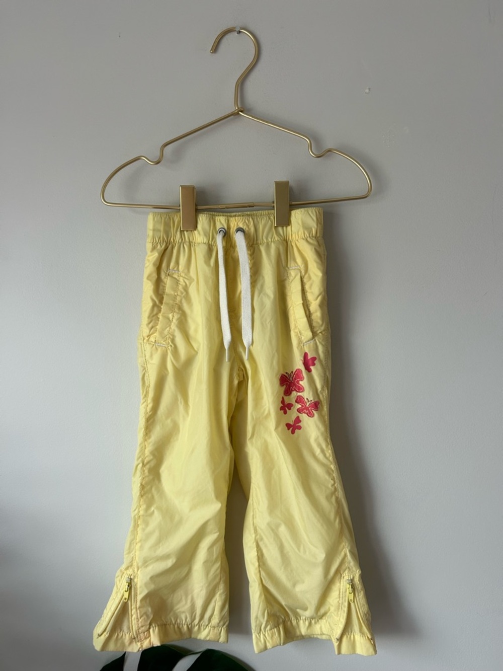 Old Navy Yellow Kids Drawstring Pants with Pink Floral Accents